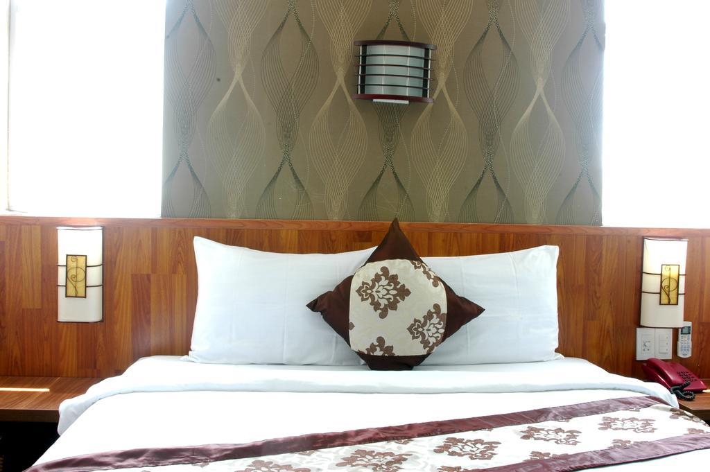 Minh Nhat Hotel نها ترانج الغرفة الصورة
