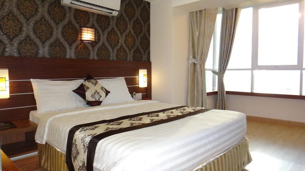 Minh Nhat Hotel نها ترانج الغرفة الصورة