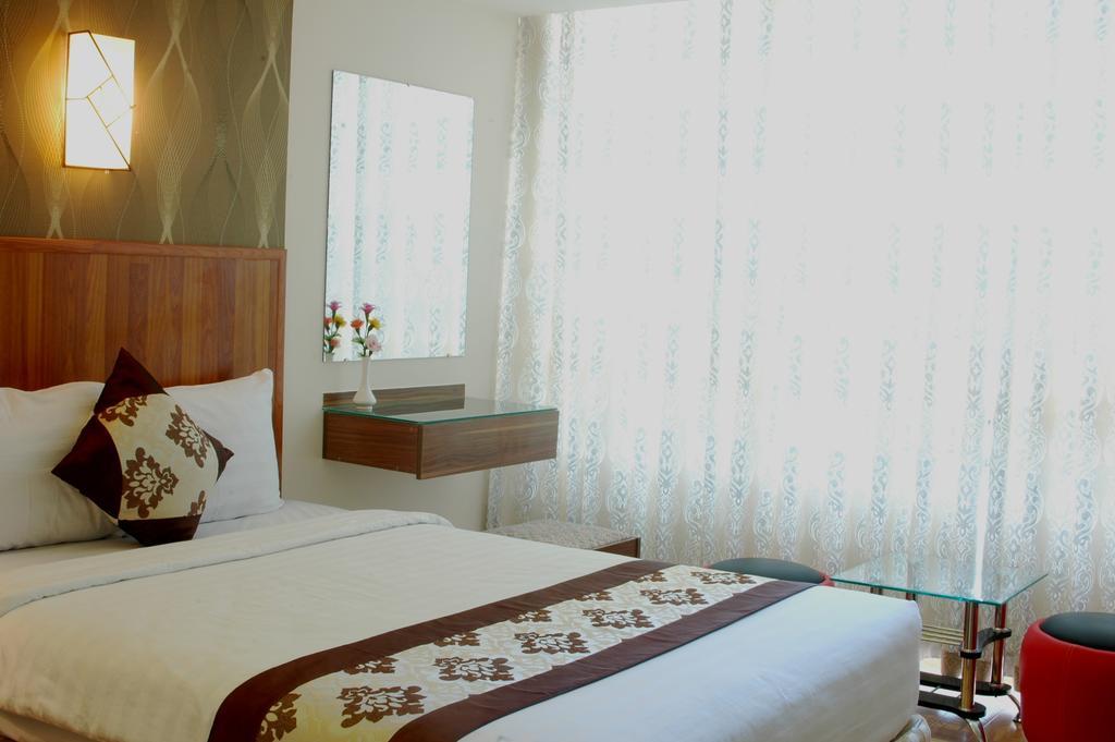 Minh Nhat Hotel نها ترانج الغرفة الصورة