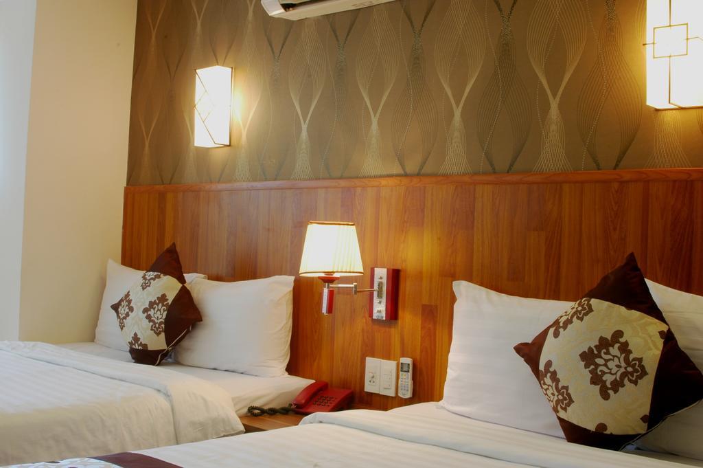Minh Nhat Hotel نها ترانج الغرفة الصورة