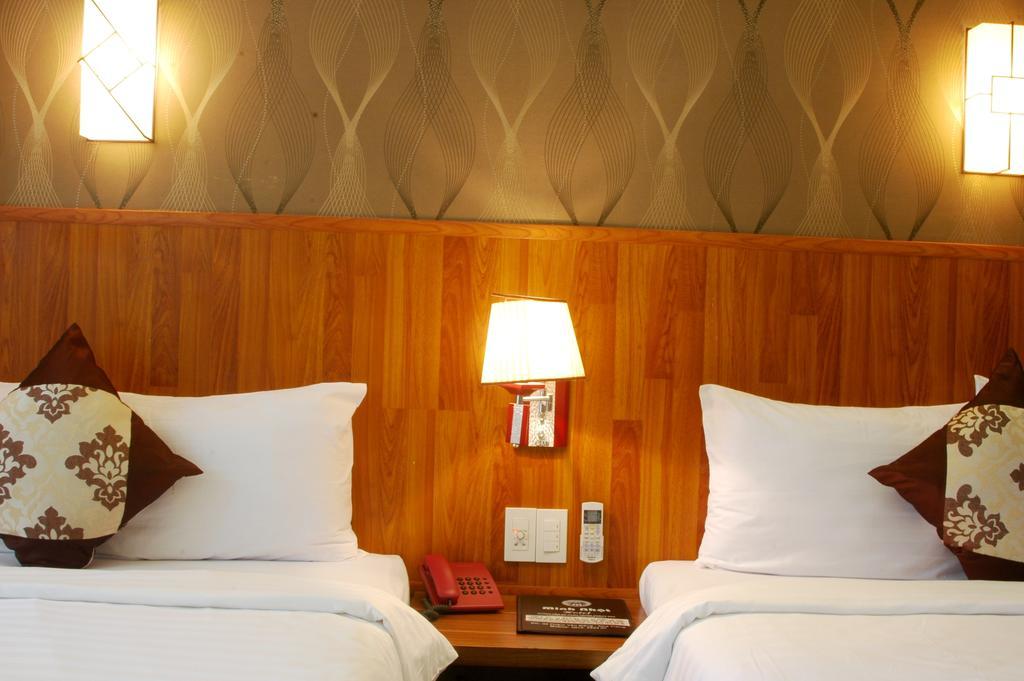Minh Nhat Hotel نها ترانج الغرفة الصورة