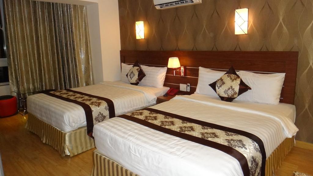 Minh Nhat Hotel نها ترانج الغرفة الصورة