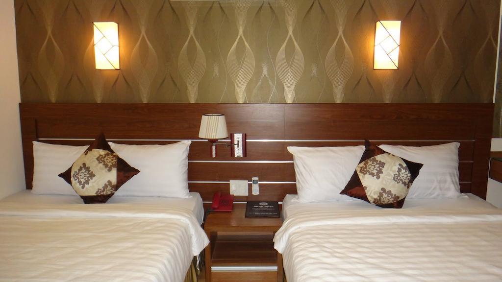 Minh Nhat Hotel نها ترانج الغرفة الصورة